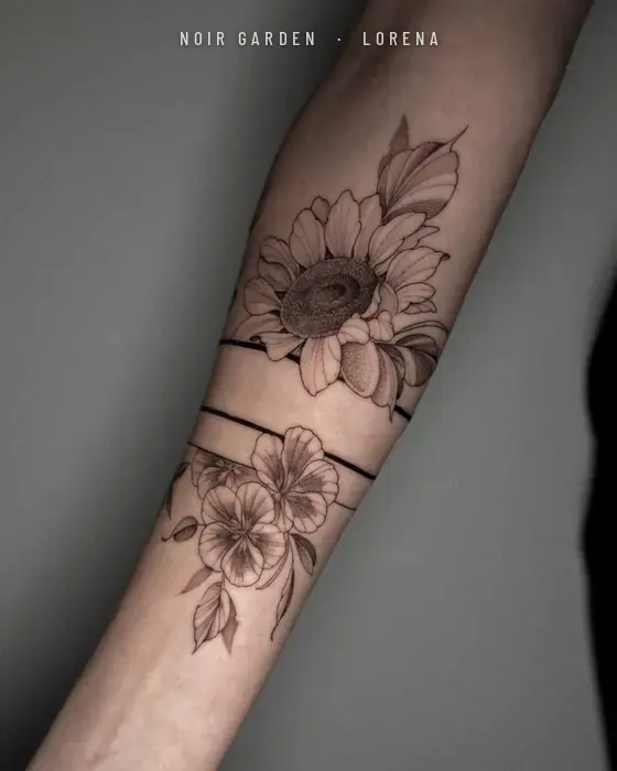 Girasol y pensamientos separados por bandas en el antebrazo